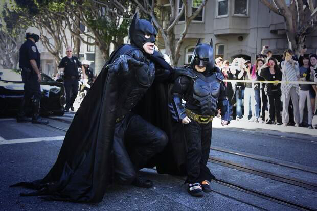  SF Batkid assesses the situation on the streets of San Francisco with his hero, Batman on Nov. 15. Image courtesy Make-A-Wish Greater Bay (@SFWish)